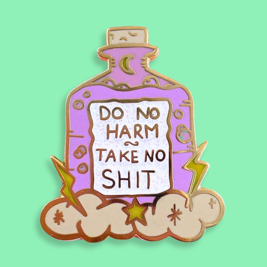 A hard enamel lapel pin on a green background. The pin is purple and in the shape of a bottle with clouds and lightning bolts. The pin reads Do No Harm Take No Shit.