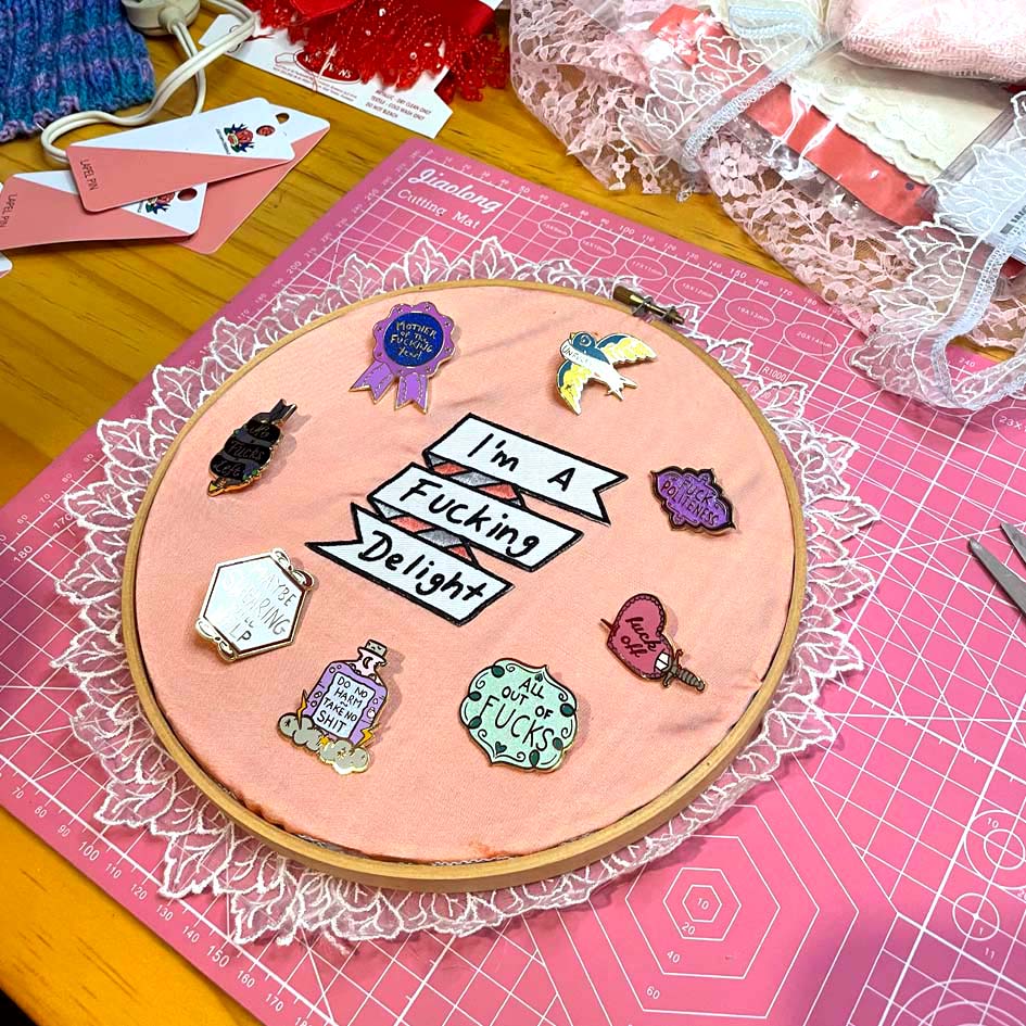 How to make an upcycled enamel pin display using an embroidery hoop