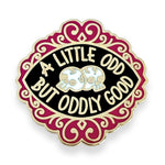 Pin with 'A Little Odd But Oddly Good' text and skull design on a white background