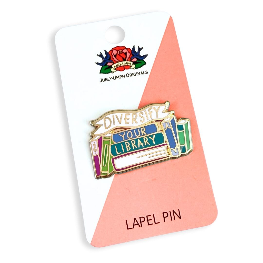 Lapel pin with 'Diversify Your Library' text on a card with 'Jubly-Umph Originals' branding.