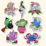 Set of colorful stickers with various designs and text on a beige background