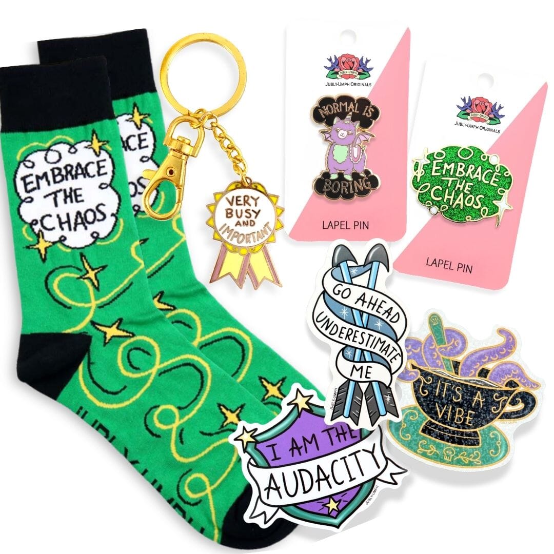 Green socks with text, keychain, and lapel pins on a white background