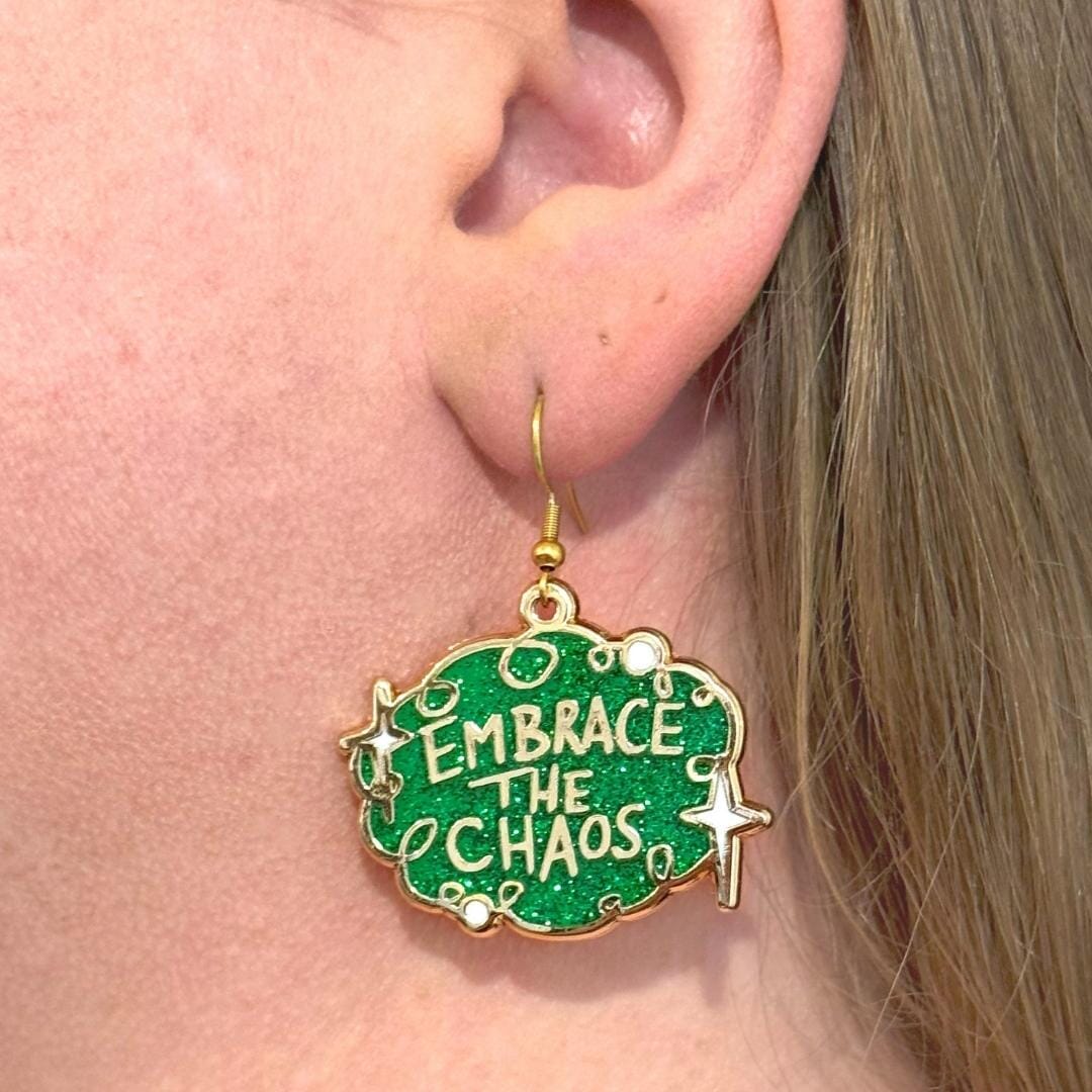 Embrace the chaos earring on ear