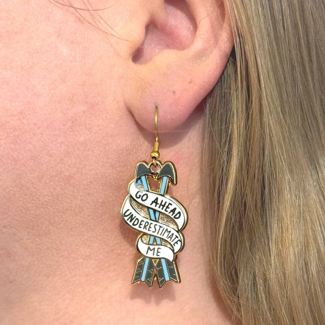 Go ahead underestimate me earring on ear