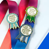 Three pins on a lanyard