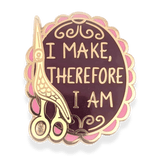 Pin with scissors design and 'I make, therefore I am' text on a purple background