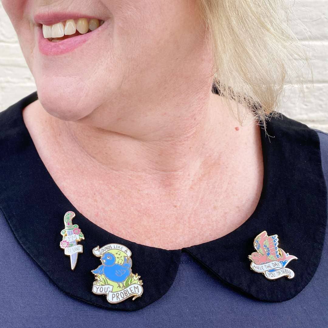 I'm Blunt, You Problem and Have the Day you Deserve pins on a velvet collar