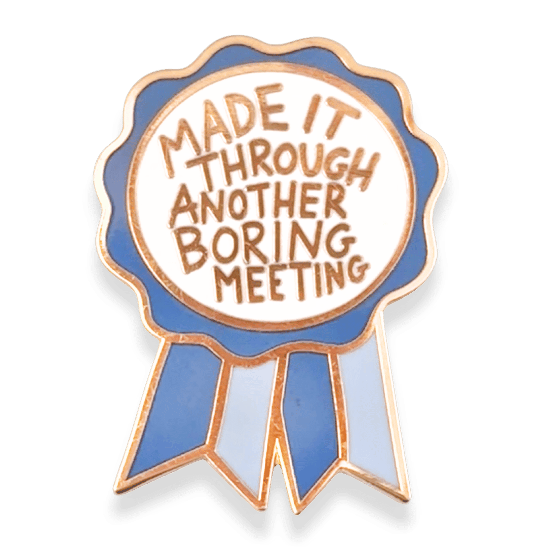 Pin with text 'Made it through another boring meeting' on a white background