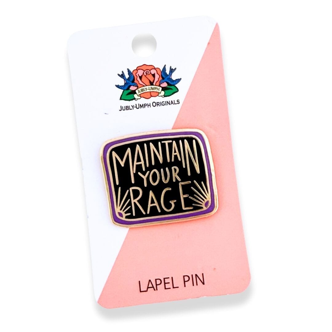 Lapel pin with 'Maintain Your Rage' text on a pink card with brand logo.