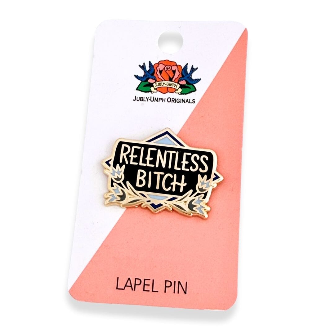 Lapel pin with 'Relentless Bitch' text on a branded card