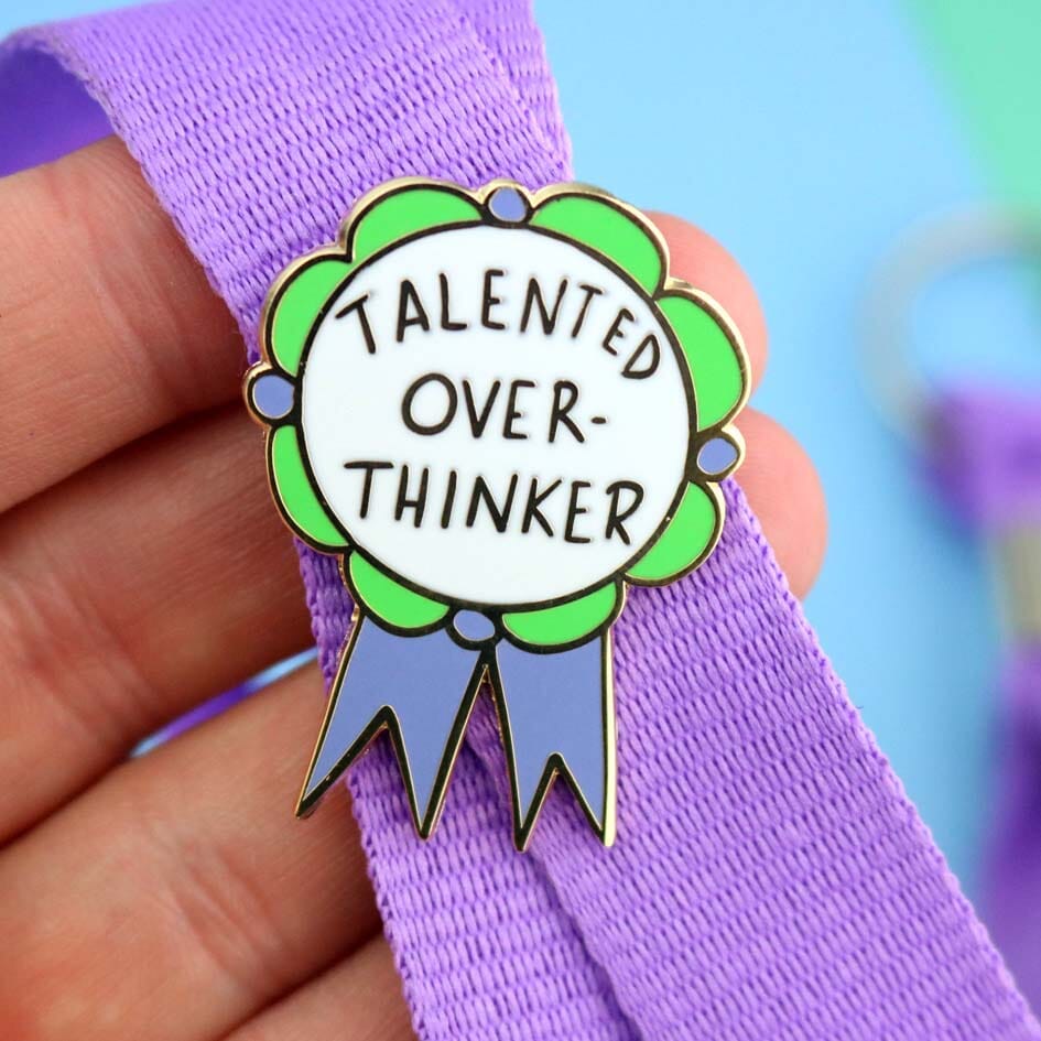 Talented Over Thinker Lapel Pin on a Lanyard