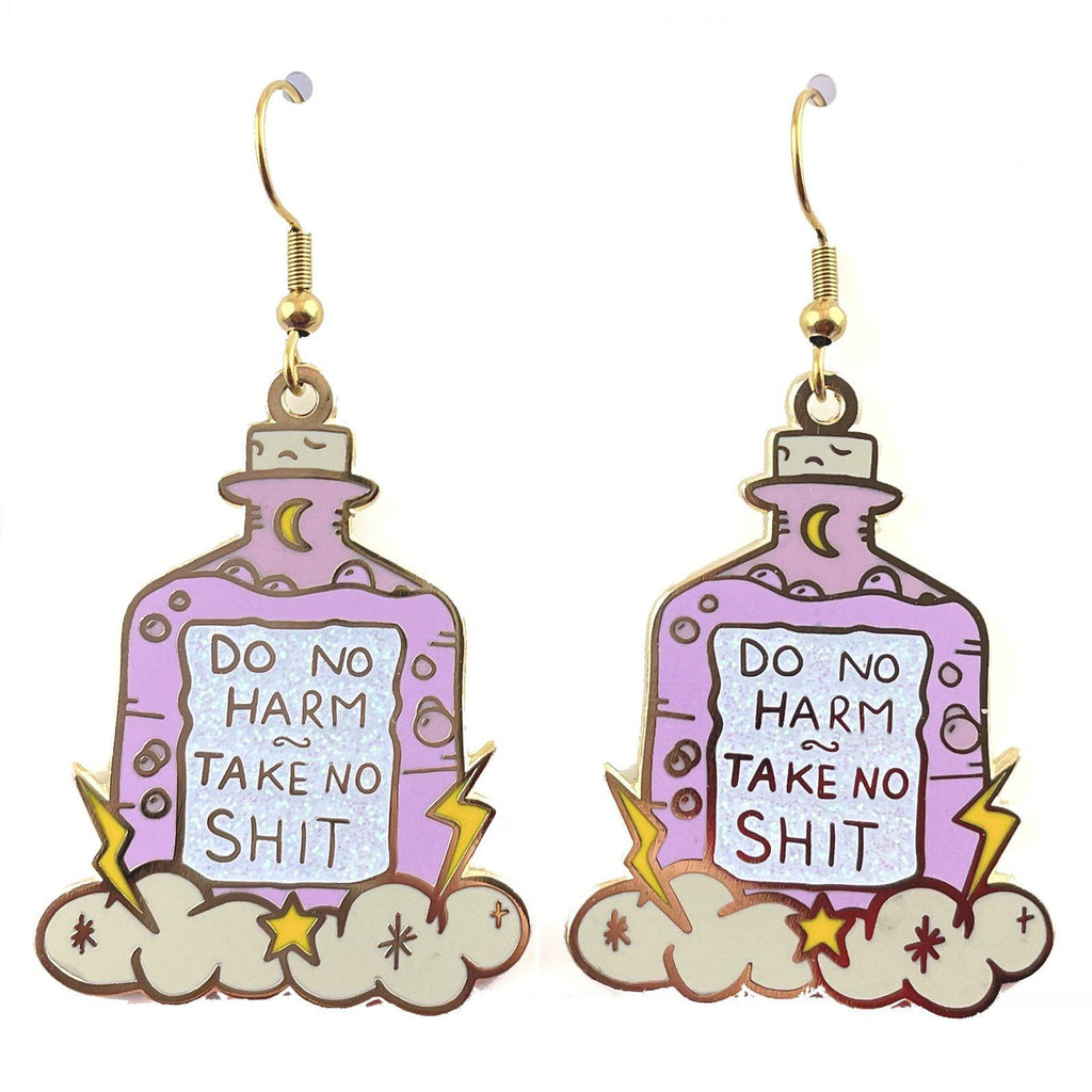 A pair of dangle earrings displayed on a white background. The earrings are purple and in the shape of a bottle with clouds and lightning bolts. The earrings read Do No Harm Take No Shit.